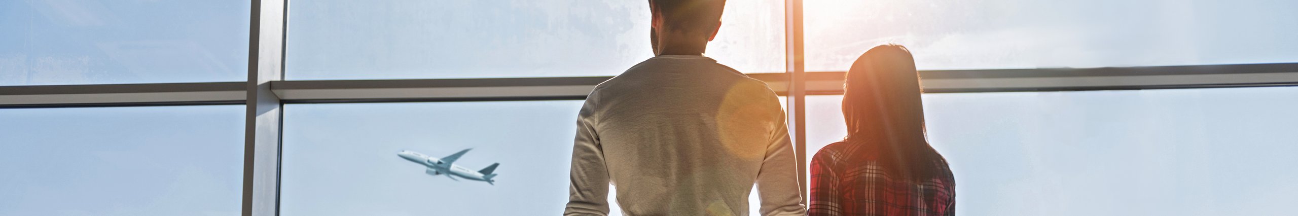 Airport passengers with luggage looking out onto the runway from inside the airport. Illustration of seamless airport parking. 