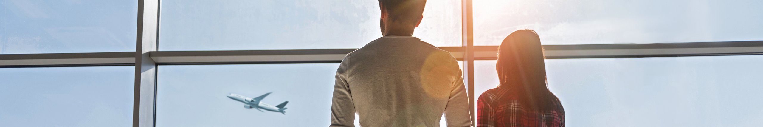 Airport passengers with luggage looking out onto the runway from inside the airport. Illustration of seamless airport parking.