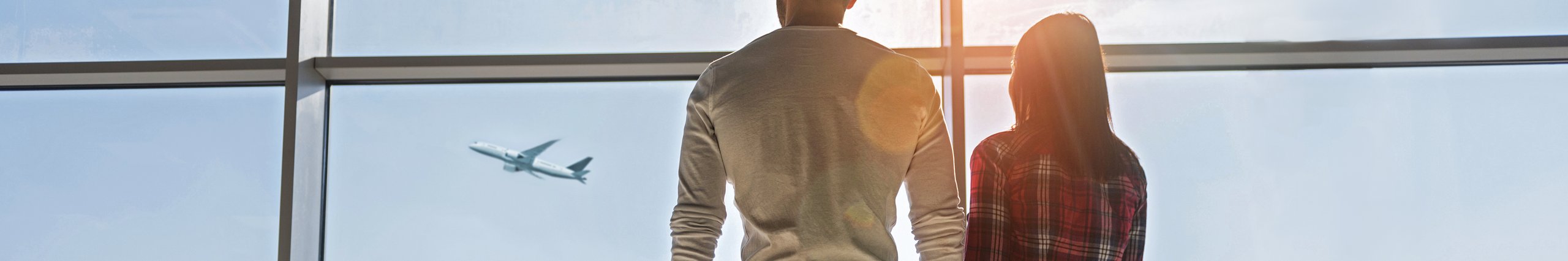 Airport passengers with luggage looking out onto the runway from inside the airport. Illustration of seamless airport parking. 